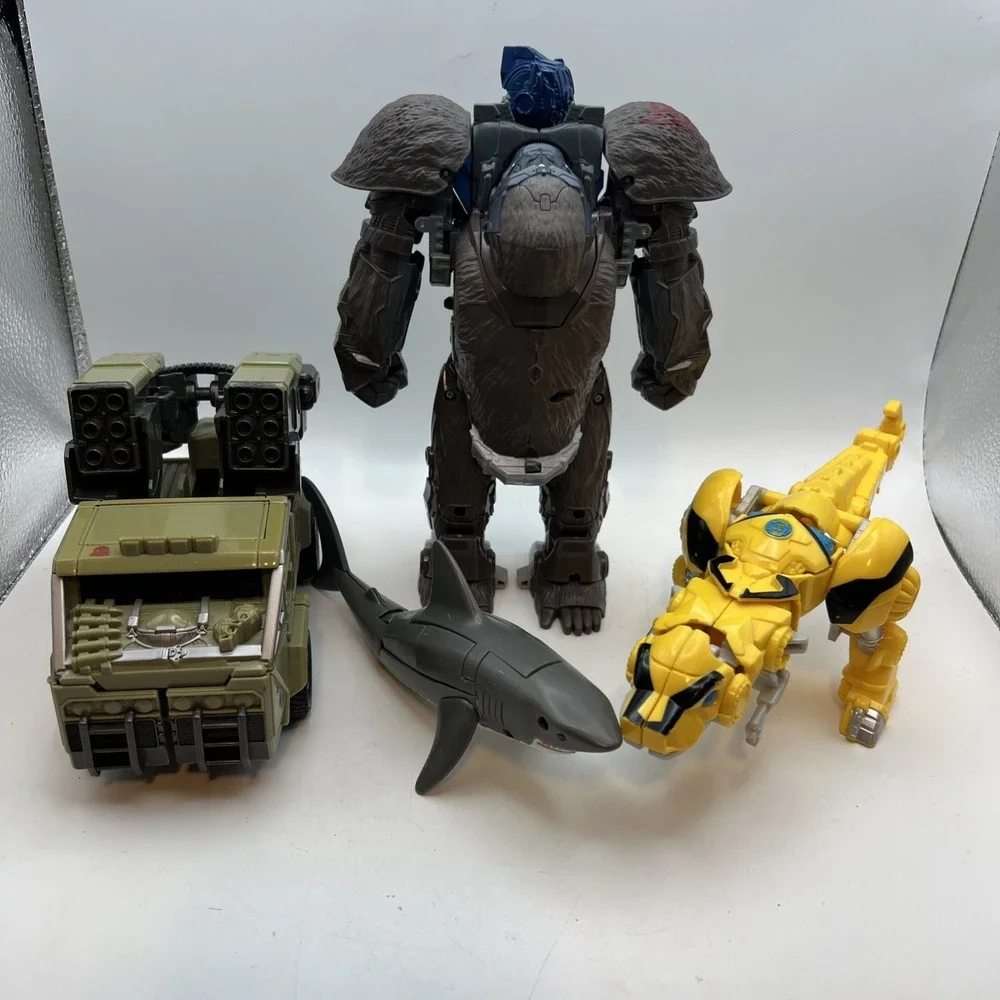 Lot Of 4 Mixed Year Transformers READ